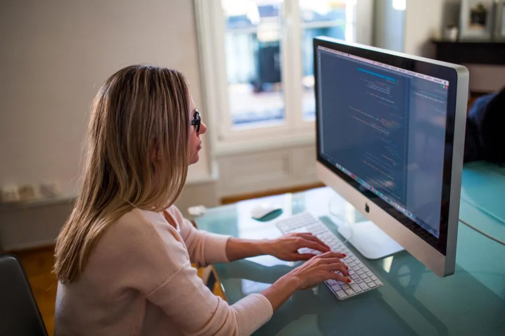 Person selecting ICAO English exam or training service online