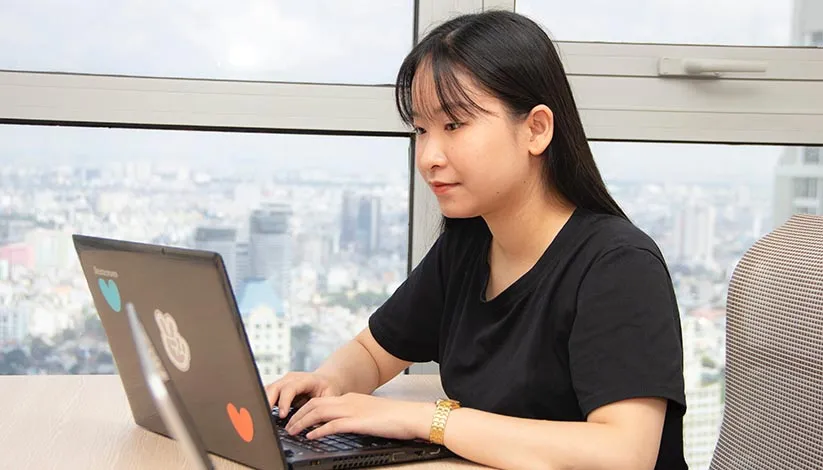 Person taking ICAO English test online via Zoom on a laptop